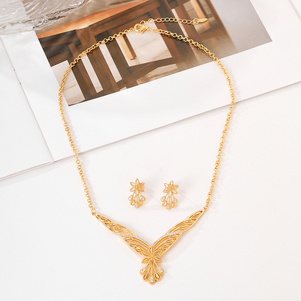 El estilo popular del Oriente Medio opciones transfronterizas de cobre y aluminio pendientes de piedra collar conjunto de joyas de mujer pernos de dos piezas conjunto de joyas