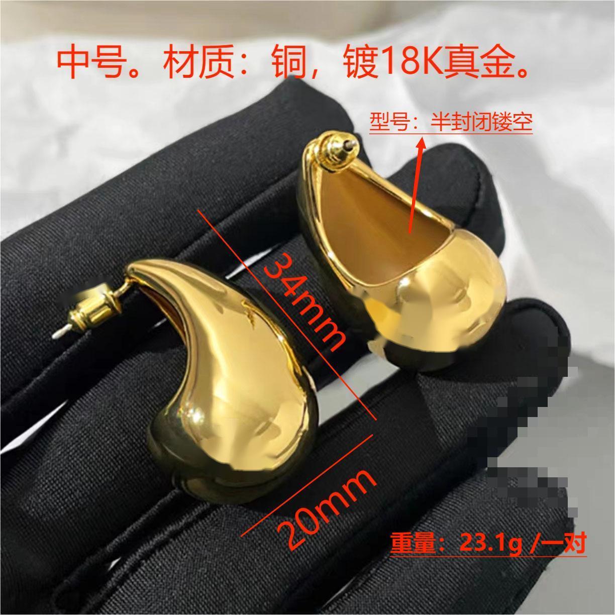 Moda europea y americana estilo caliente viento frío grande pequeña gota de agua brillante hueco 18K oro alta textura las mujeres pendientes