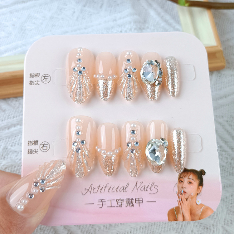 Manicura de Año Nuevo, 10 piezas de diamantes de perlas hechos a mano, arte de uñas portátil, parche de uñas Xiaohongshu, venta al por mayor