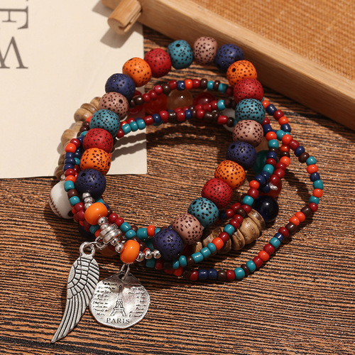 Bohemian multi-layer rice bead bracelet with wings, personal and versatile, suitable for ethnic style travel photography, women's bracelet for dropshipping