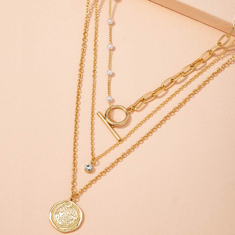 collier de perles en or et diamantspicture6
