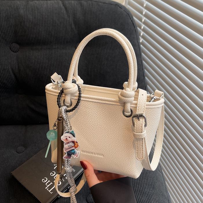 Bolso de cubo portátil para mujer, nuevo bolso de mensajero de textura salvaje 2025, bolso de canasta de verduras de moda retro de alta gama