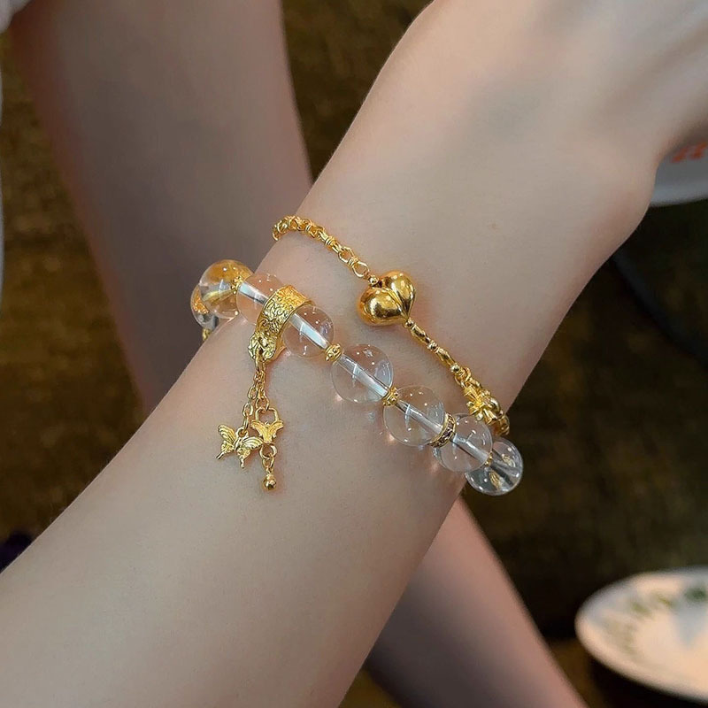 Xiaohongshu 人気のホワイトウォータービーズブレスレットゴールデンタッセルアクセサリー絶妙なハイエンドブレスレットファッションモデルドロップシッピング|undefined