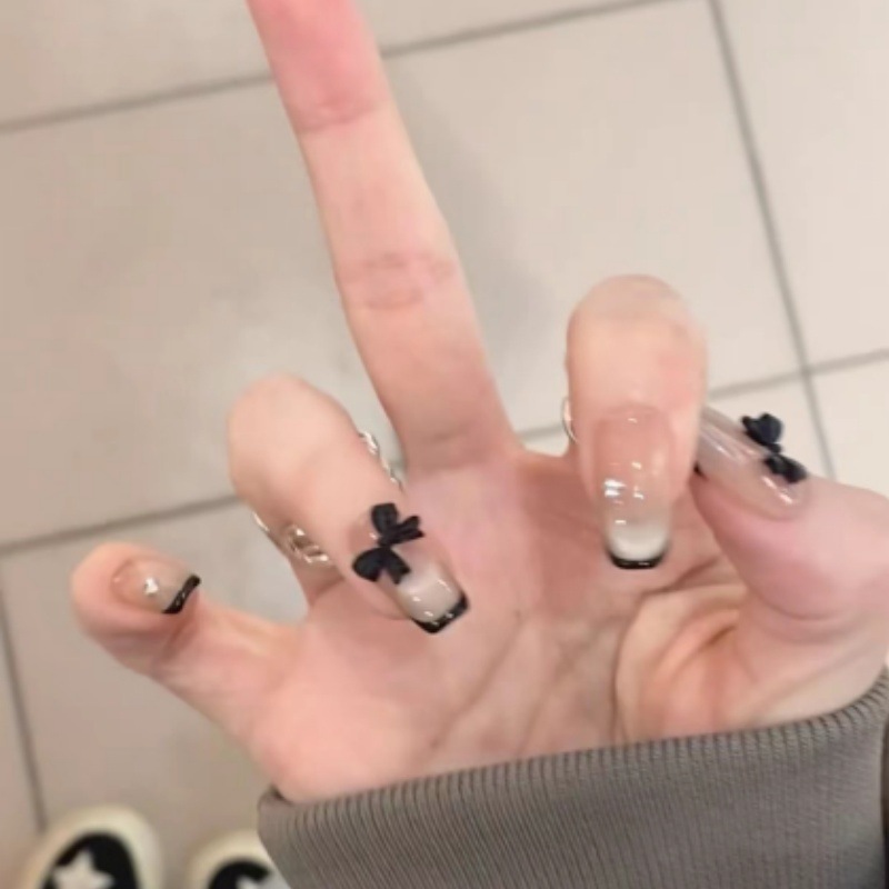 Uña hecha a mano pura arco de ojo de gato terapia de luz de uñas de alto nivel color sólido negro es un estilo de lujo ligero chino