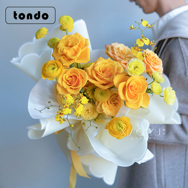 Tang de nueva flor papel de embalaje nube jalea Película Caja Completa al por mayor engrosada impermeable color sólido ramo de papel de embalaje
