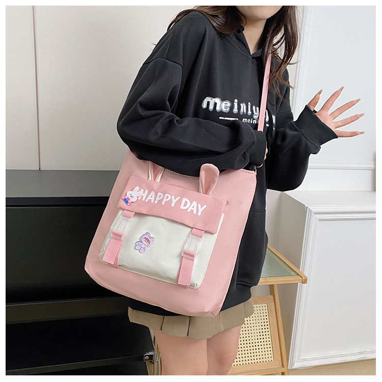 Large-capacity file bag, primary school student handbag that can be carried on one shoulder, book bag for girls with high appearance standards, homework books and test papers bag undefined