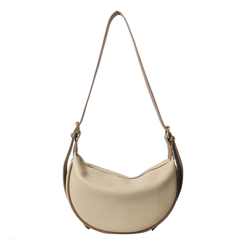 Bolso de mochila simple y popular, bolso de mujer de estilo extranjero 2024, nuevo verano coreano, bolso de hombro casual de color sólido.