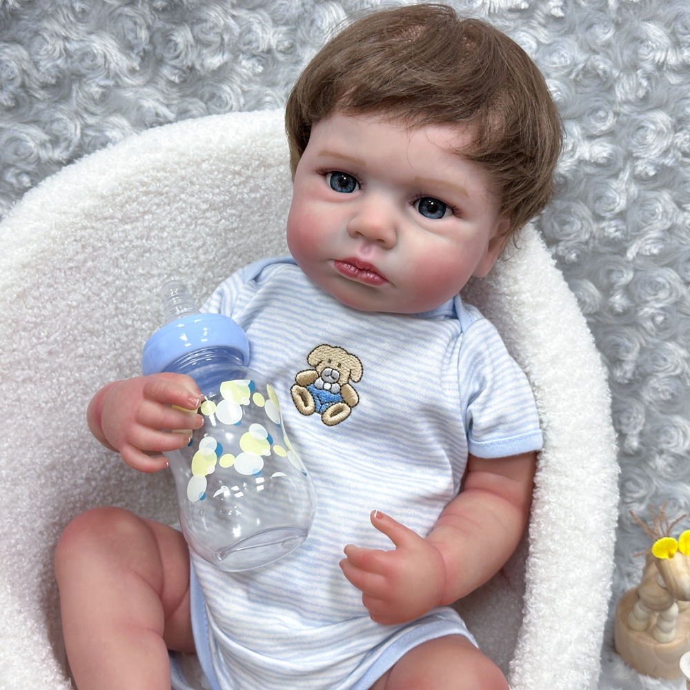 Una fuente de envío de muñecas para bebés pesados transfronterizos 20 pulgadas muñecas de simulación para recién nacidos LouLou