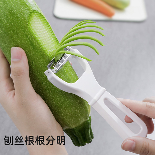 Japanese fruit and vegetable grater, kitchen helper, melon and fruit hanging peeling knife, peeler, household labor-saving shredder