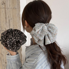 韓国系の甘い花の蝶結びのヘアピンの新型のシフォンのリボンの後頭部の馬尾のクリップの半分はサメのクリップを刺します。