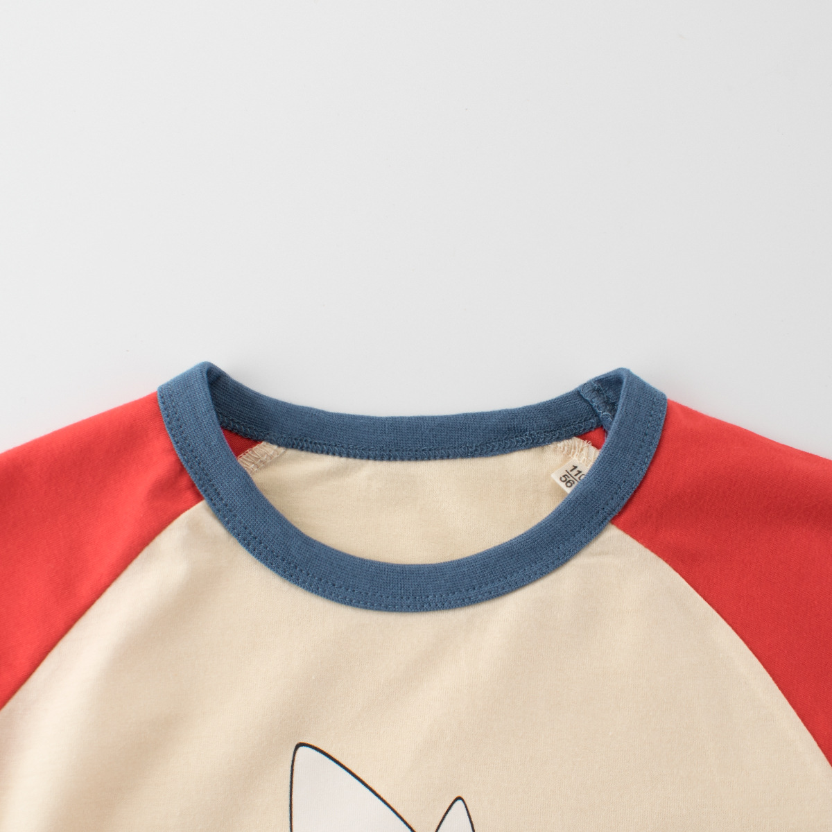 27kids ropa para niños 2025 verano nueva camiseta de manga corta para niños de dibujos animados coreanos top raglán para niños al por mayor