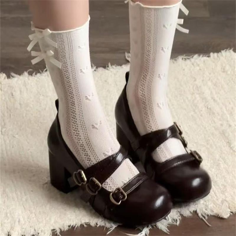 Retro negro francés tacones gruesos zapatos de una sola mujer 2026 nueva primavera con falda universal aumento de altura zapatos mary-zhen