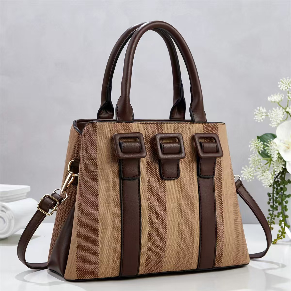 Bolsa de mano casuales a rayas simples temperamento de moda bolsas de hombro de viaje diario versátil mochila bolsas transfronterizas