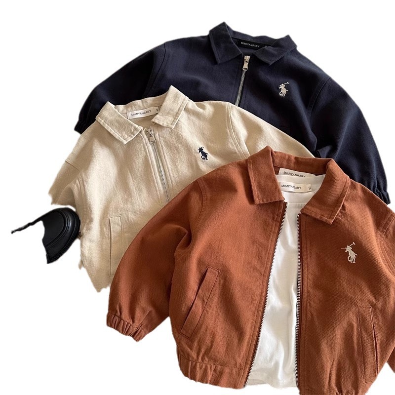 Abrigo infantil de otoño de 2025, nuevos productos coreanos para niños y niñas bordados extranjeros abrigo de solapa, camisa corta con cremallera para bebés