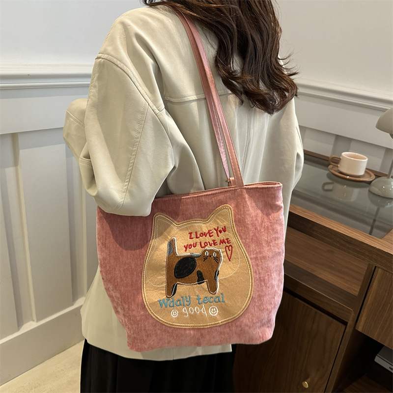 Bagos de gran capacidad para chicas encantadoras otoño / invierno 2024 nuevo estilo retro bolso de hombro de moda alta sensación bolso de brazo