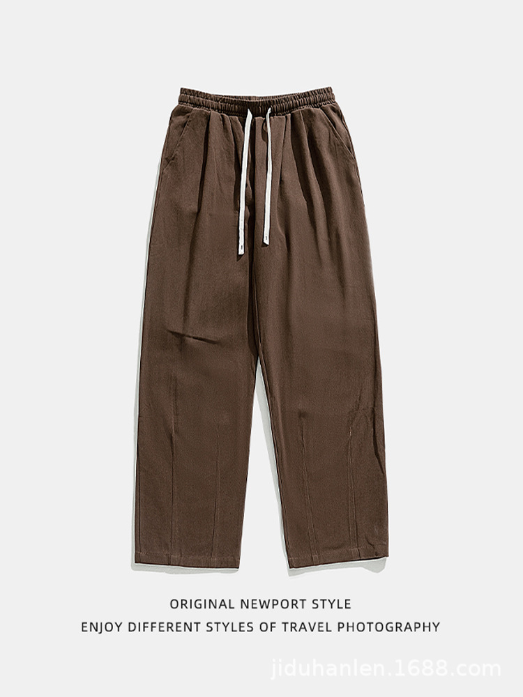 Pantalones casuales sueltos lavados en arena retro japoneses, estilo de primavera para hombres, marca de moda, diseño plisado tridimensional de todo fósforo más pantalones de terciopelo