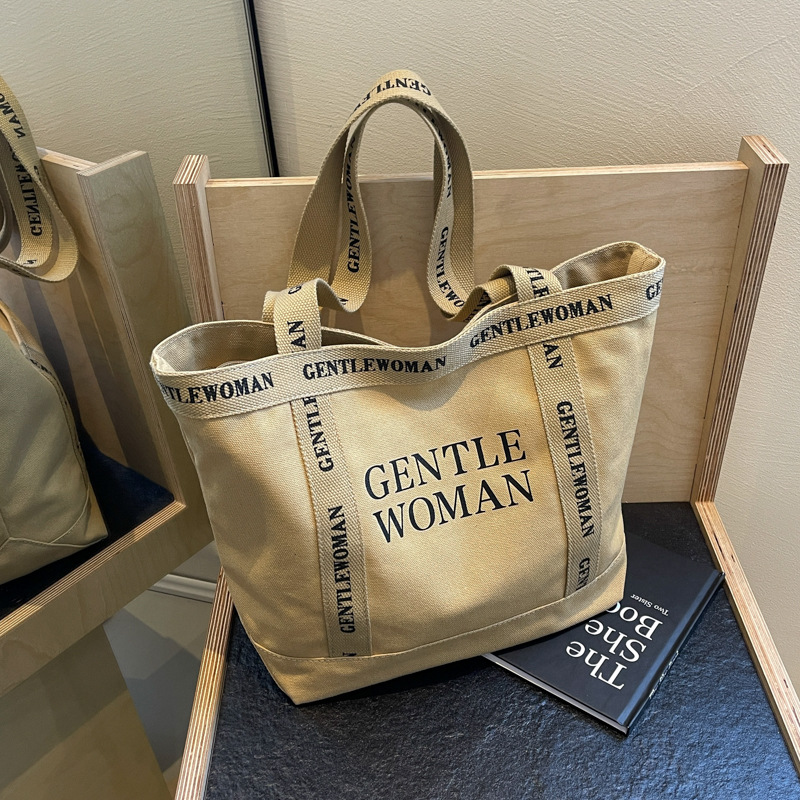 Moda simple lienzo impreso carta bolsa de hombro 2024 gran capacidad de trabajo de alta calidad bolso de mano