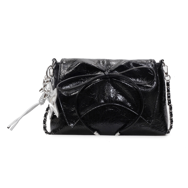 Versión coreana del bolso de cadena de nicho 2025 verano nuevo bolso femenino moda bowknot bandolera de textura de alta calidad