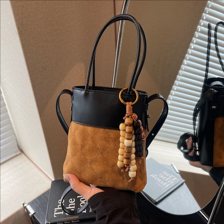 Bolsa de cubo de mano mate transfronteriza bolsa de teléfono móvil de gamuza mujeres otoño y invierno 2025 nuevo estilo de alta calidad bolso de hombro