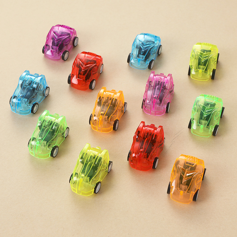 Cabeza de dinosaurio graffiti transparente mini pull back coche empuje pequeño regalo divertido huevo juguete