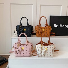 女性のためのハイエンドの質感のハンドバッグ 2025 新しいファッション通勤バケットバッグ夏の野菜バスケットクロスボディバッグ