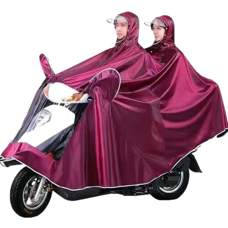 Vehículo eléctrico chaqueta de lluvia aumentada chaqueta de lluvia gruesa motocicleta de doble persona un solo viaje coche de batería