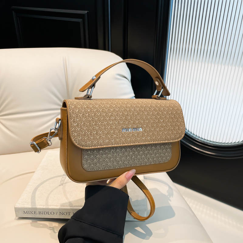 Textura al por mayor de lujo ligero bolso de mano bolso de mujer otoño 2025 nuevo estilo extranjero empalme bolso de hombro bolso de viaje