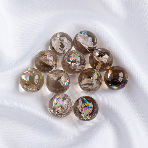 Manufacturer wholesale natural tea crystal smoky crystal colorful glue flower crystal ball seven-star array degaussing stone purification stone ornaments