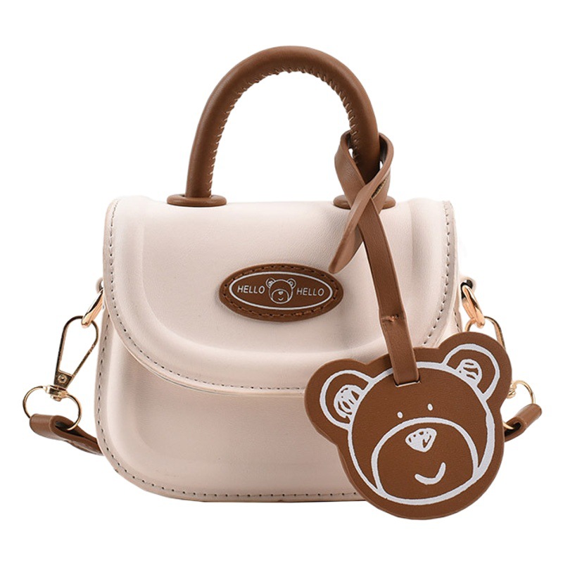 2023 otoño nuevo estilo coreano nicho niños mini mano de la muchacha llevar crossbody accesorios lápiz labial pequeña bolsa al por mayor
