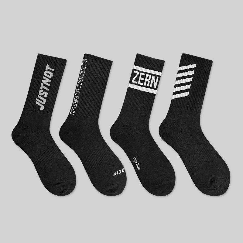Calcetines de primavera y otoño para hombres calcetines de media pantorrilla medias desodorantes transpirables casuales versátiles letras de moda estudiante baloncesto calcetines deportivos