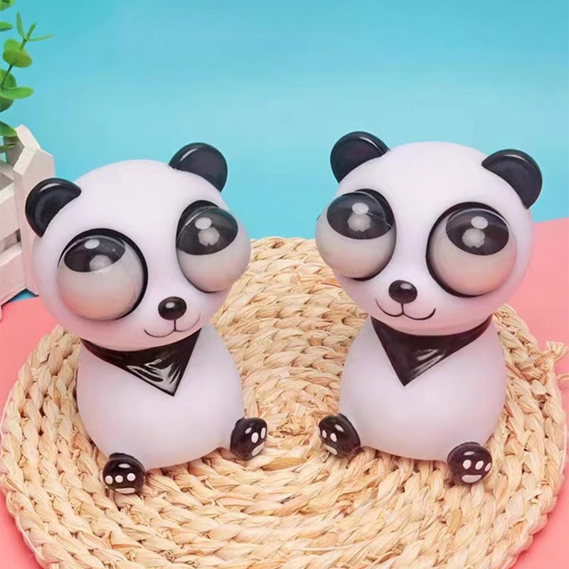 Juguetes panda de ojos explosivos exprimieron los ojos, descomprimieron la presión, amasaron la música, descomprimieron los artefactos, los niños desahogaron pequeños regalos divertidos para la cirugía plástica.