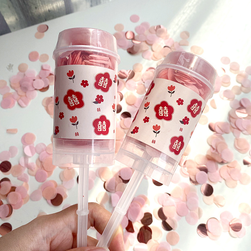 Boda tubo de pulverización boda pequeño regalo pistola mano empuje giro pistola cumpleaños pequeño regalo bomba empuje música