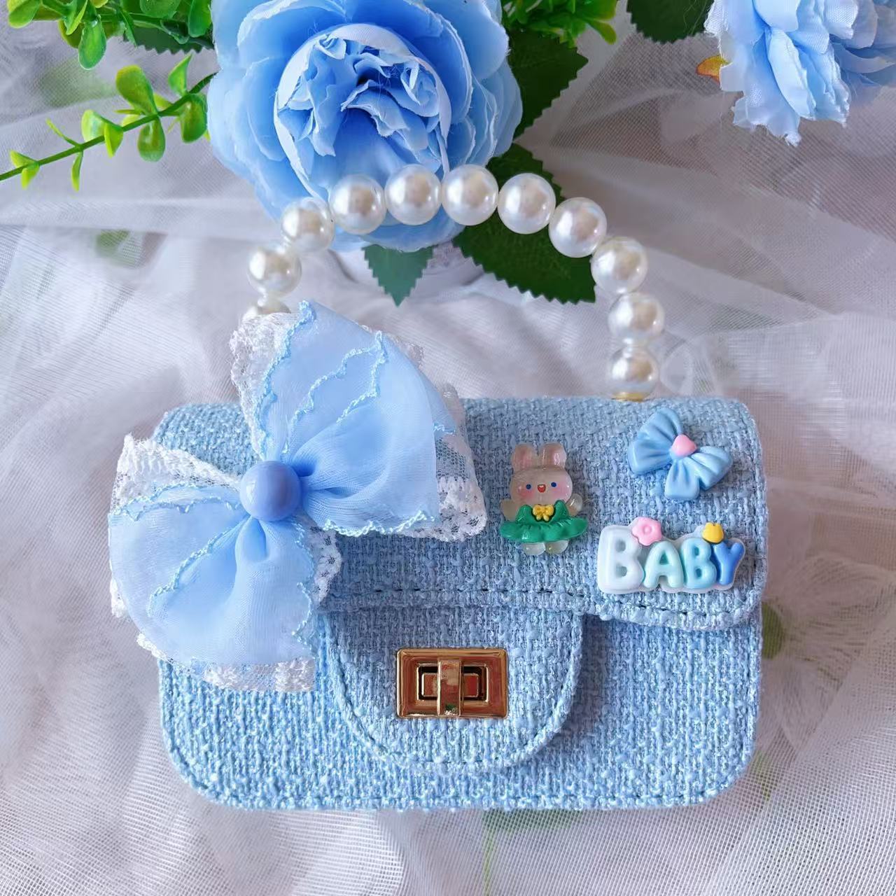 Nuevo tipo de bolsos para niños, bolsos de moda, bolsos de princesa de viento, bolsos portátiles lindos para chicas, bolsos de red para bebés.