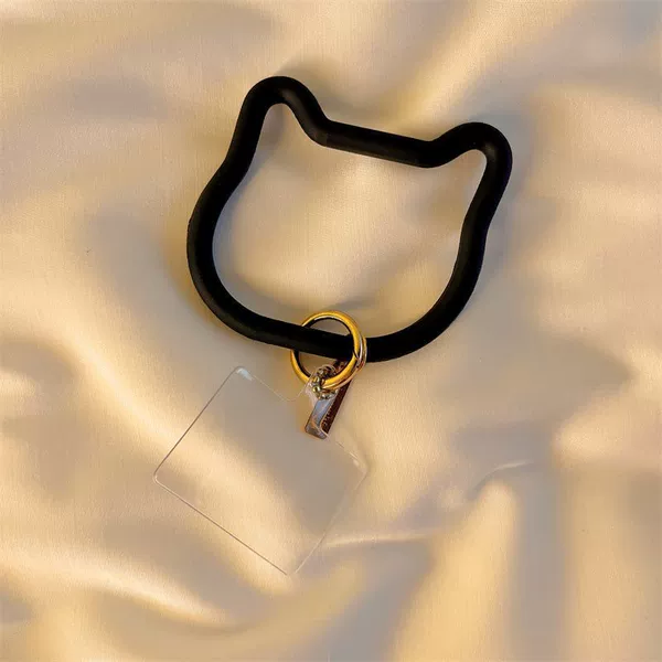 Black bracelet, cards, cat