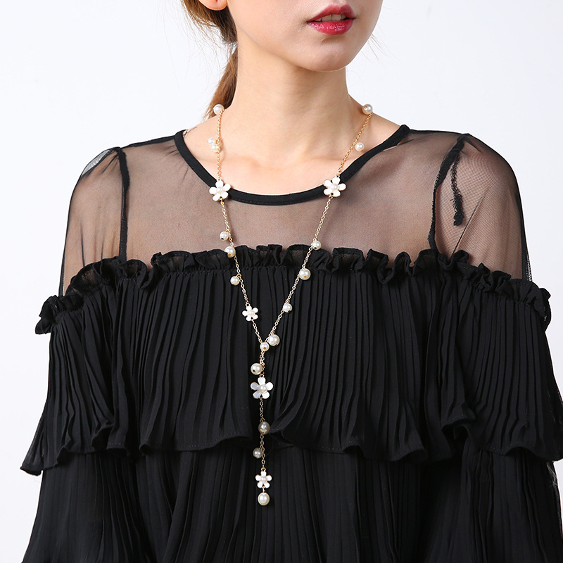 Estilo coreano moda de alta calidad borla larga cadena de suéter de flores de cinco hojas Otoño e Invierno simple collar de borla de todo fósforo joyería femenina