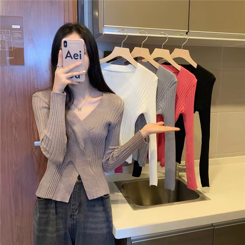 Spot wholesale spring and summer New irregular foreign style V-neck solid color slim long sleeve knitted bottoming sweater ins Spot wholesale spring and summer New irregular foreign style V-neck solid color slim long sleeve knitted bottoming sweater ins