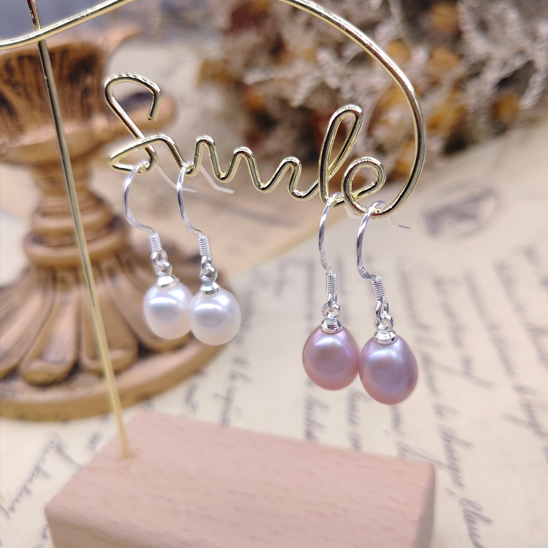 Organic earrings from pearl drop-shaped