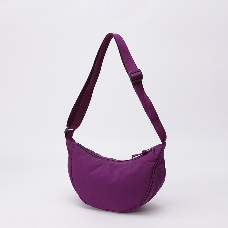 Bolso de tela pequeño bolso de moda ligero bolso de mochila de nylon transfronterizo mujer bolso de hombro casual versátil bolso de bolsas de bolsas de bollo de gran capacidad