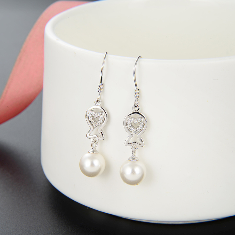 Comercio exterior diseño creativo joyería oído gancho Corea del Sur s925 pendientes de perlas de plata pendientes elegantes de las mujeres al por mayor
