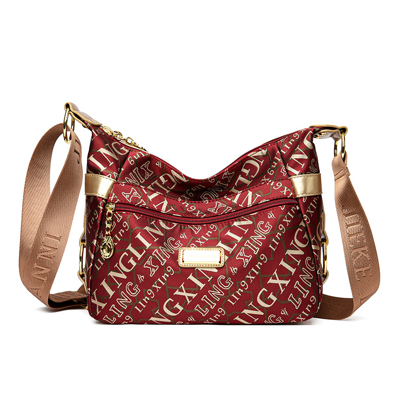 Bolsa de mujer 2023 nueva bolsa de mensajero de hombro de tela Oxford impermeable bolsa de Madre de mujer de mediana edad de gran capacidad multicompartimento