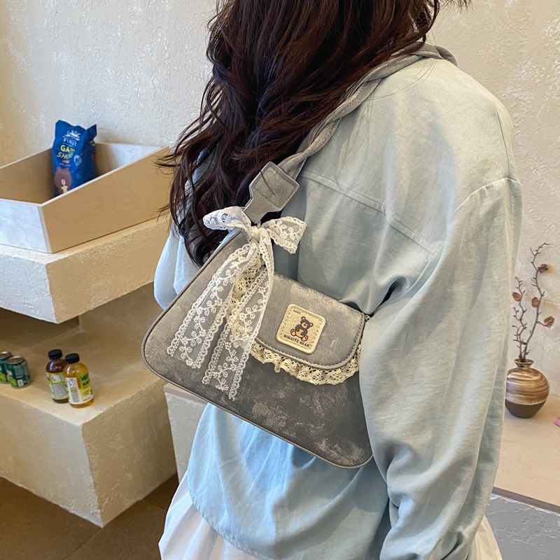 Bolsa de moda simple coreana de viaje 2026 verano nueva mujer texturas extranjeras bolsas de hombro diarias