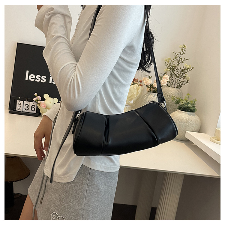 Korean version simple cylindrical women's 2024 new niche pillow versatile casual shoulder crossbody bag_voghion.com