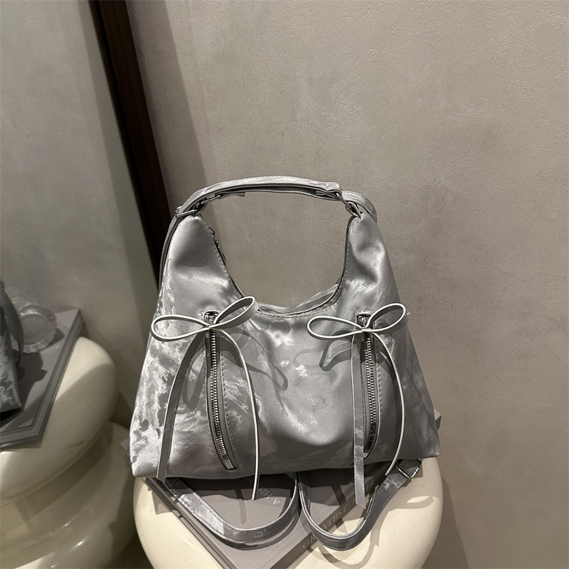 Bolsa de hombro retro suave pitot bolso arco 2025 nueva moda moda coreana bolsa de hombro de gran capacidad casual