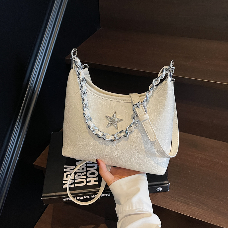 Bolsa de cadena de textura de alta calidad 2025 verano nuevo estilo bolso de hombro con patrón de agarre bolso de mensajero de estrella de diamantes mujer