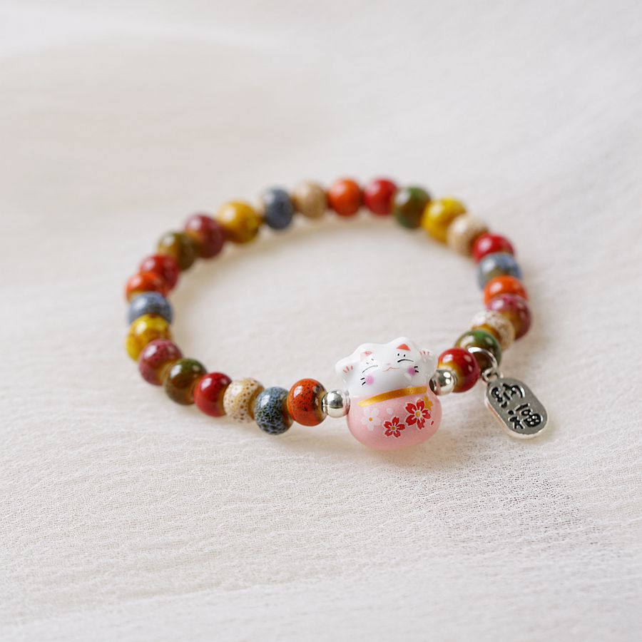 thumbnail image 1 of Novedad de verano, pequeño, fresco, literario, pastoral, dulce gato de la suerte, pulsera de cerámica con cuentas, diseño de nicho, rosa de la suerte, 1 of 2