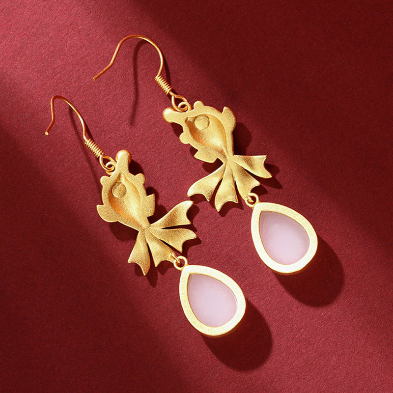 Design elegant earrings from Khotan district white jade