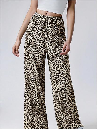 Dambyxor med vida ben och leopardmönster casual street style_voghion.com