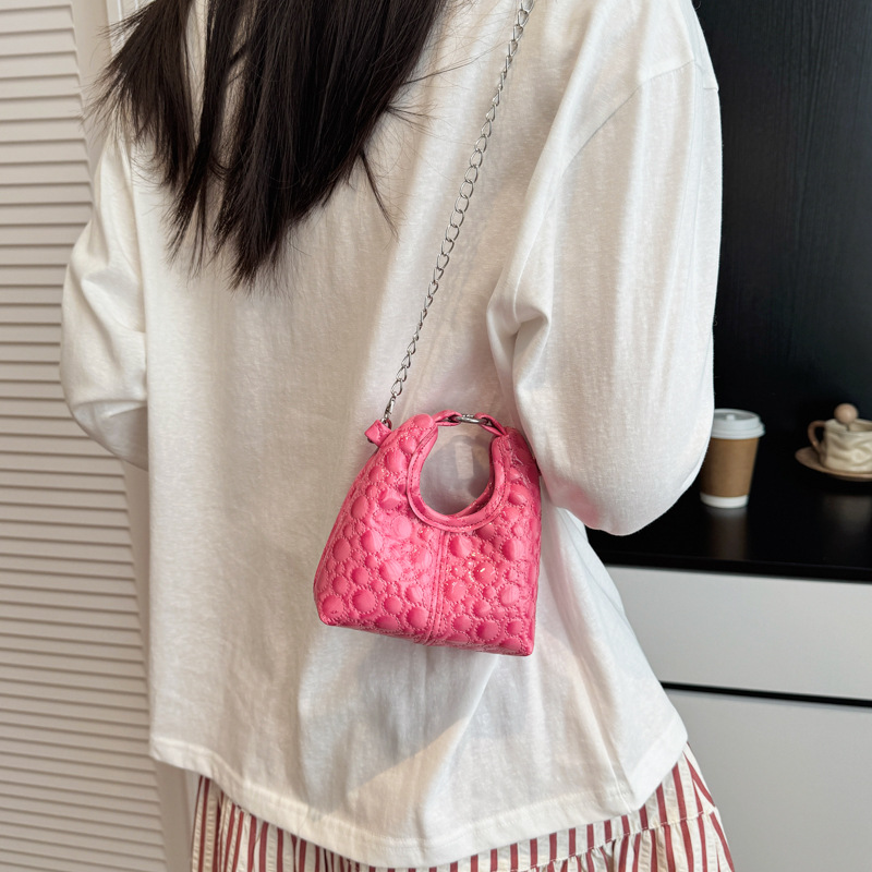 Paquete compacto mini bolso de hombro para niños y niñas coreanos simple bolso de bebé de color sólido 2026 nuevo bolso de cambio para niños