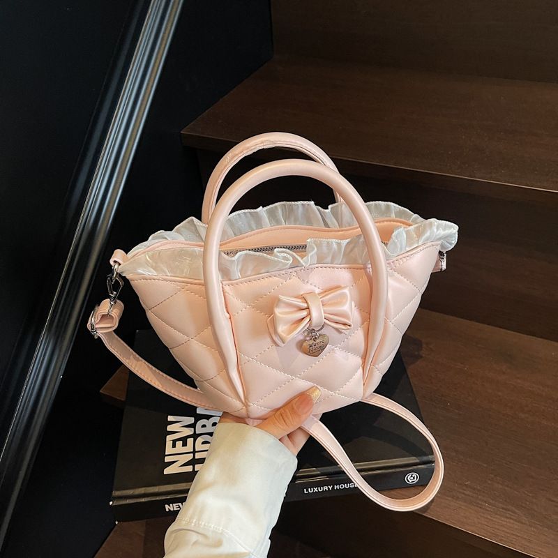 Versión coreana del bolso de nicho 2025 verano nuevo bolso femenino lindo lazo bolso de hombro bolso de mensajero bordado de diamantes