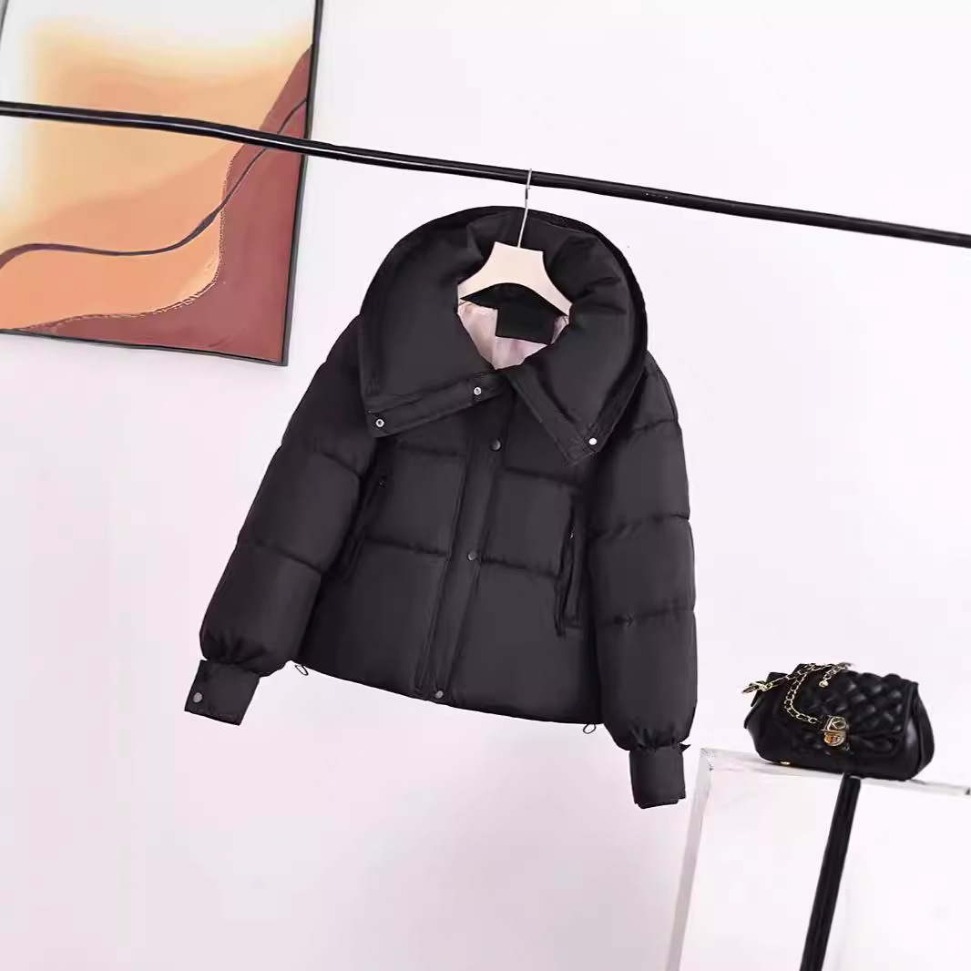 Algodón de pluma para mujeres sueltas engrosadas de moda coreana 2024 nueva moda pequeña chaqueta alta corta